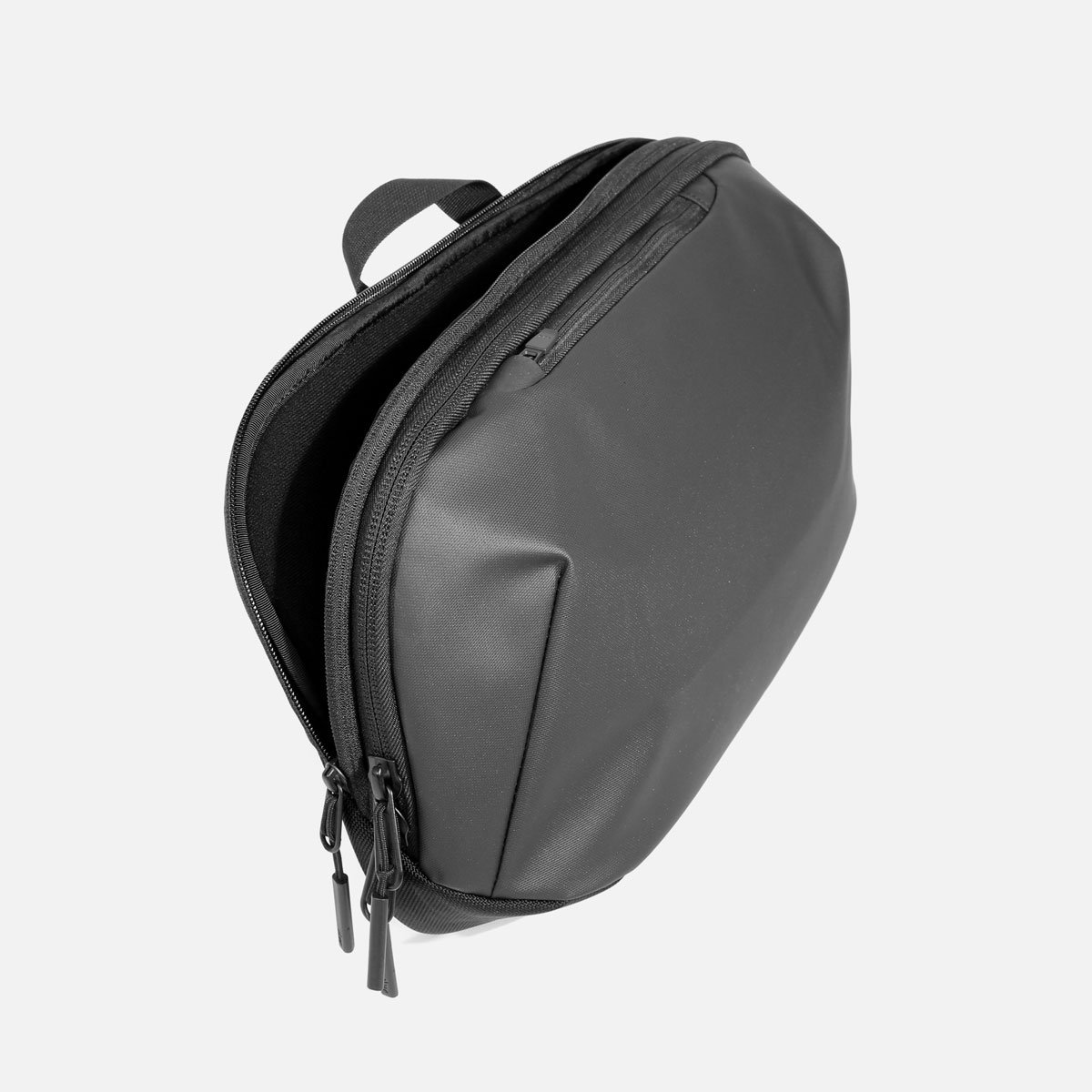 Tech shop sling backpack