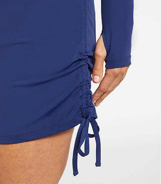 Discreet thumb holes + tie feature
