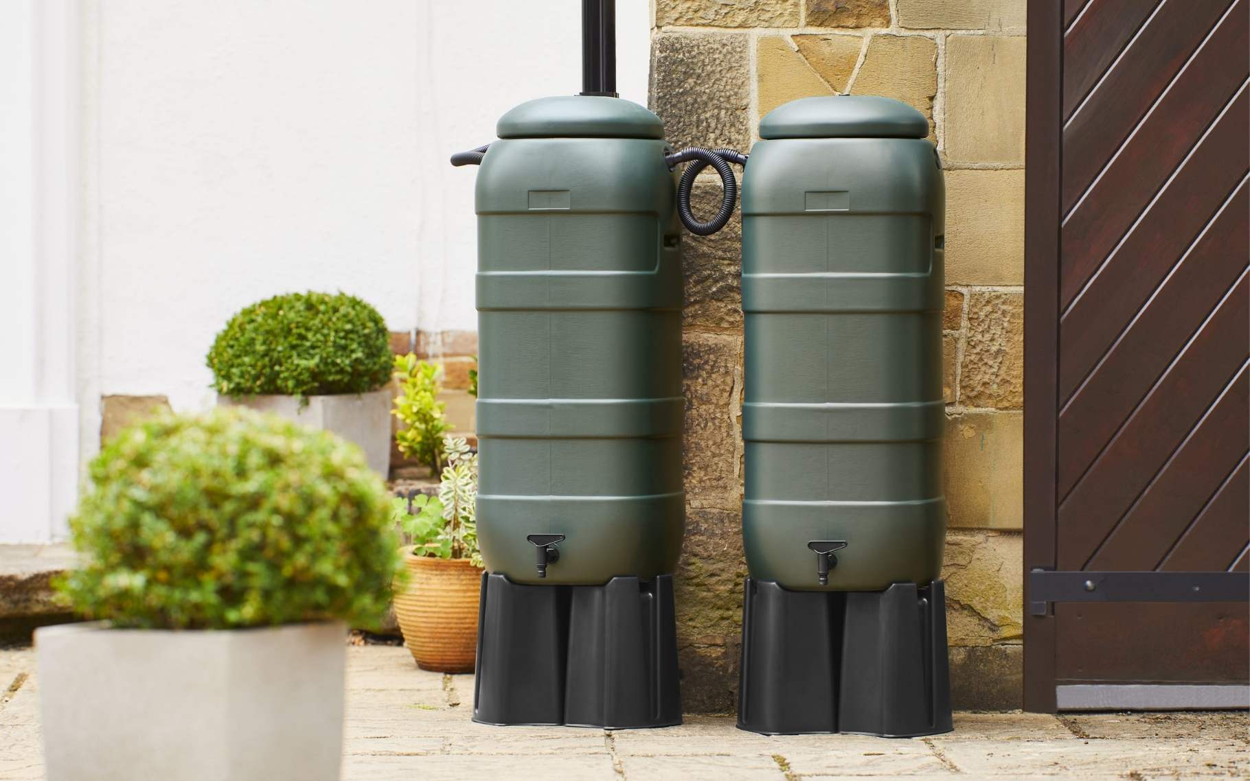 Mini Rainsaver 100 Litre Green Water Butt Double Kit in situ