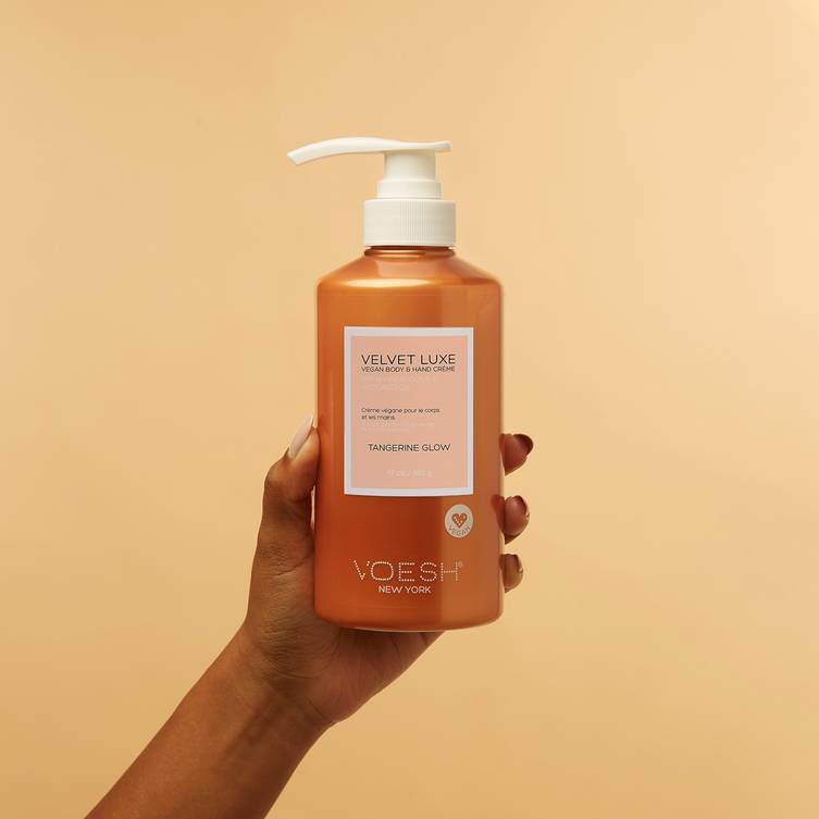 velvet luxe tangerine glow in hand