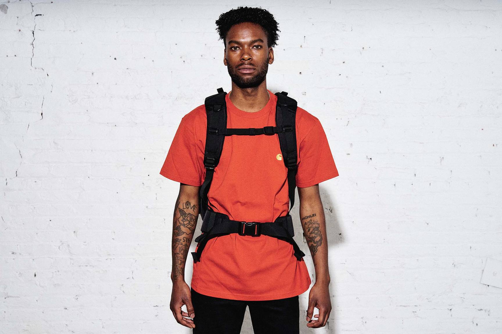 Shoulder to hip belt outlet