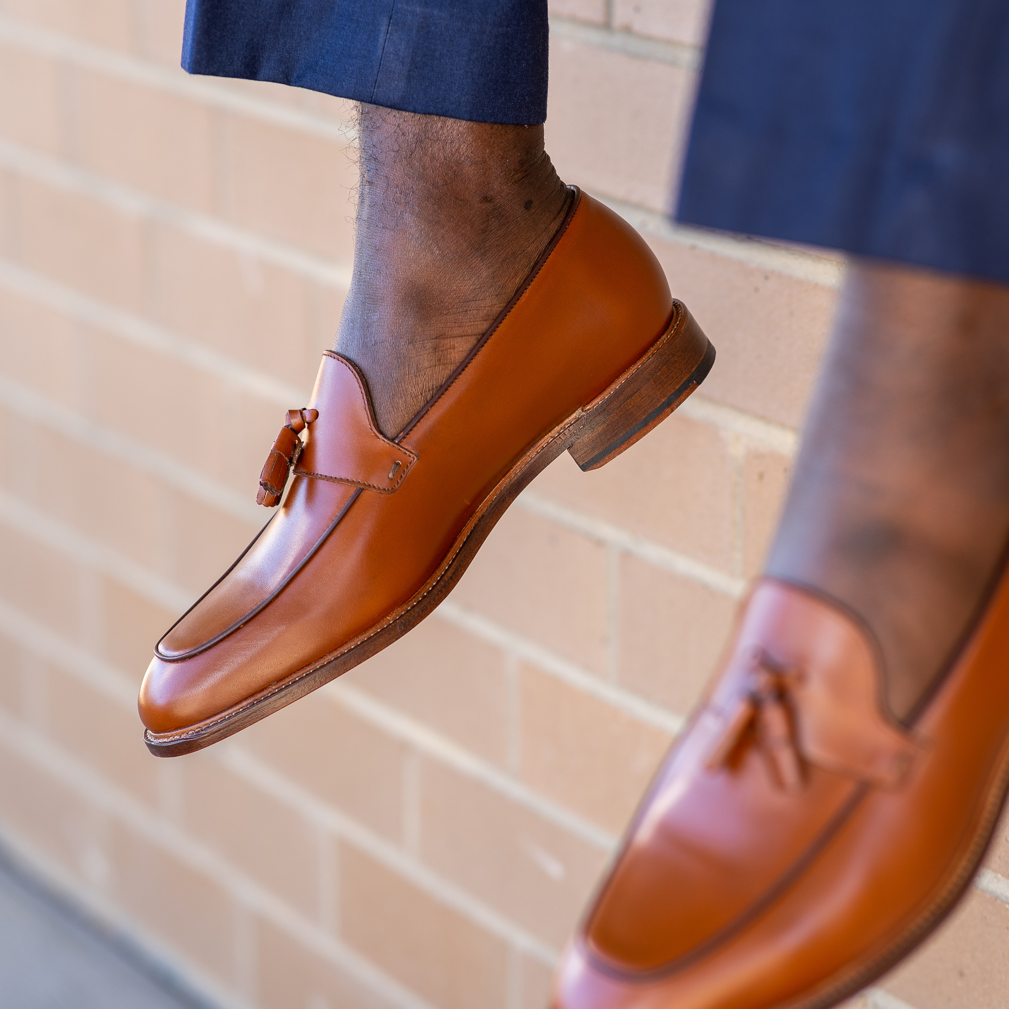 mens tan loafers paired with slim fit suit for weddings