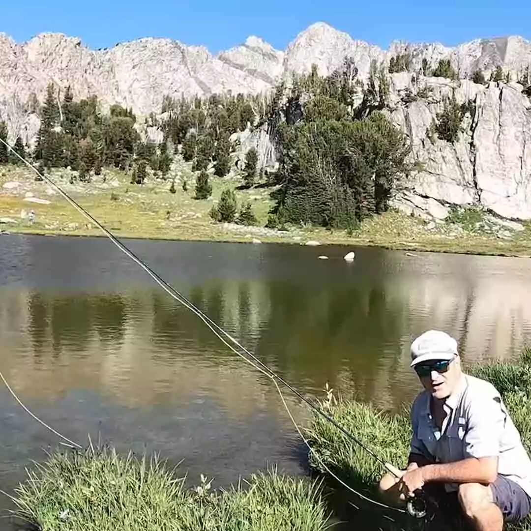 Man at Fly Fishing at a Montana Mountain Lake