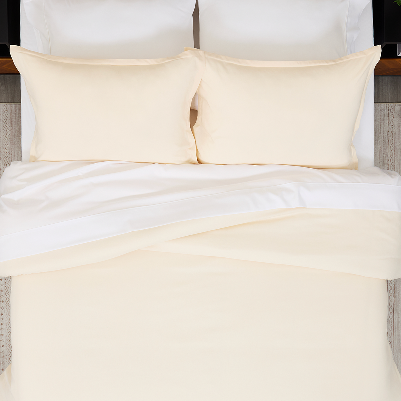 A close-up view of the duvet cover tied to the loops of a comforter.