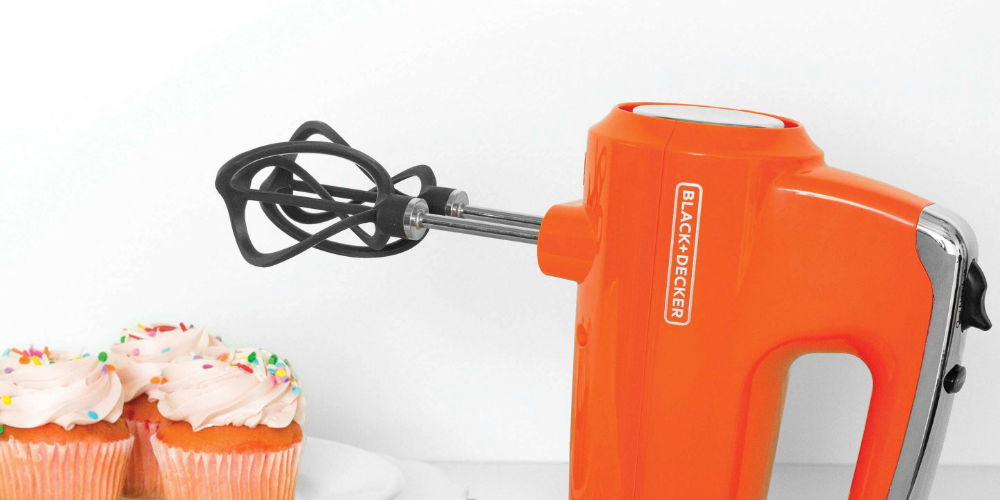 BLACK+DECKER mixer adjacent to three cupcakes