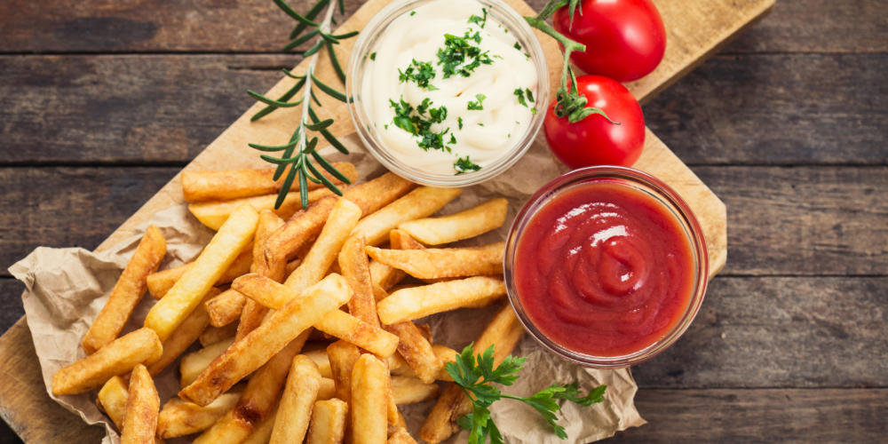 French fries on a cutting board