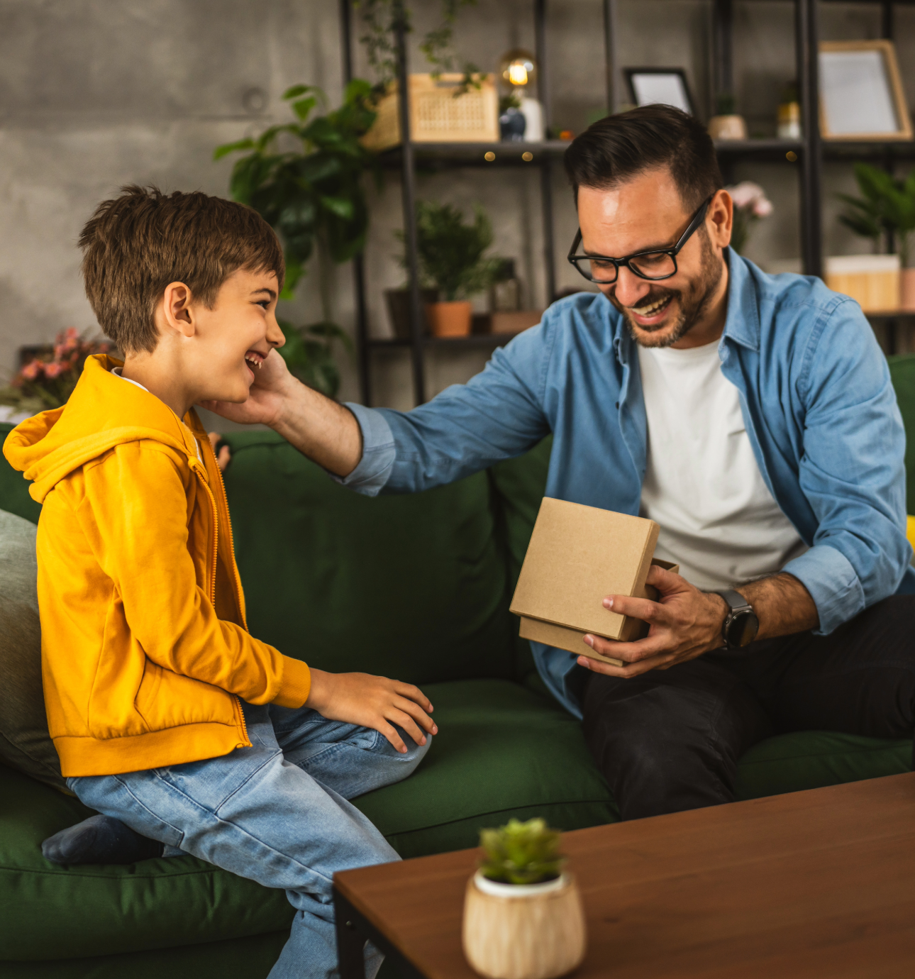 Man getting a gift from a boy