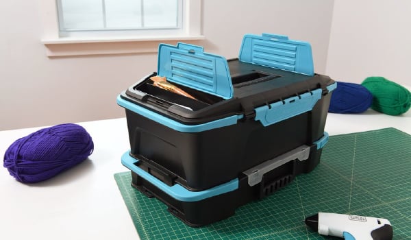 BLACK+DECKER crafting caddy and organizer set stacked together with the small compartments on the lid opened