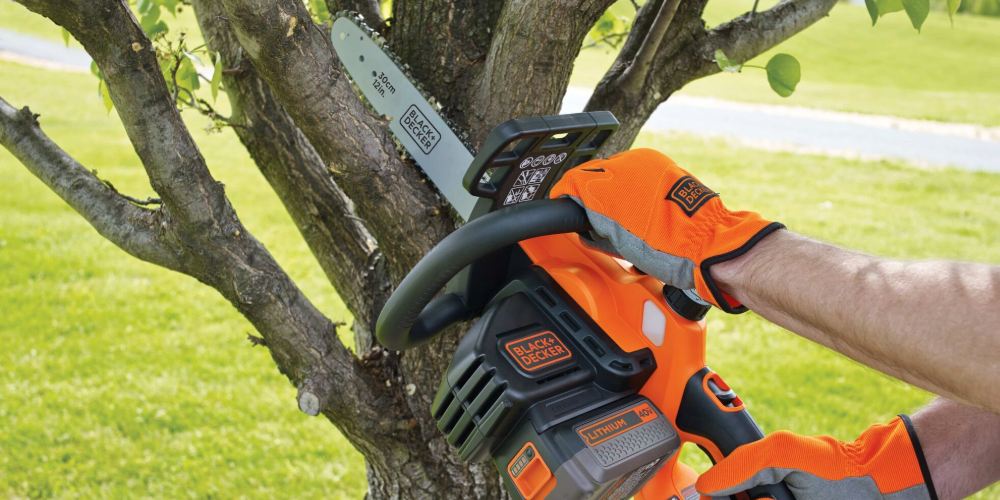 BLACK+DECKER chainsaw on a tree