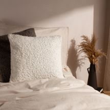 white cushions. The White Home Edit