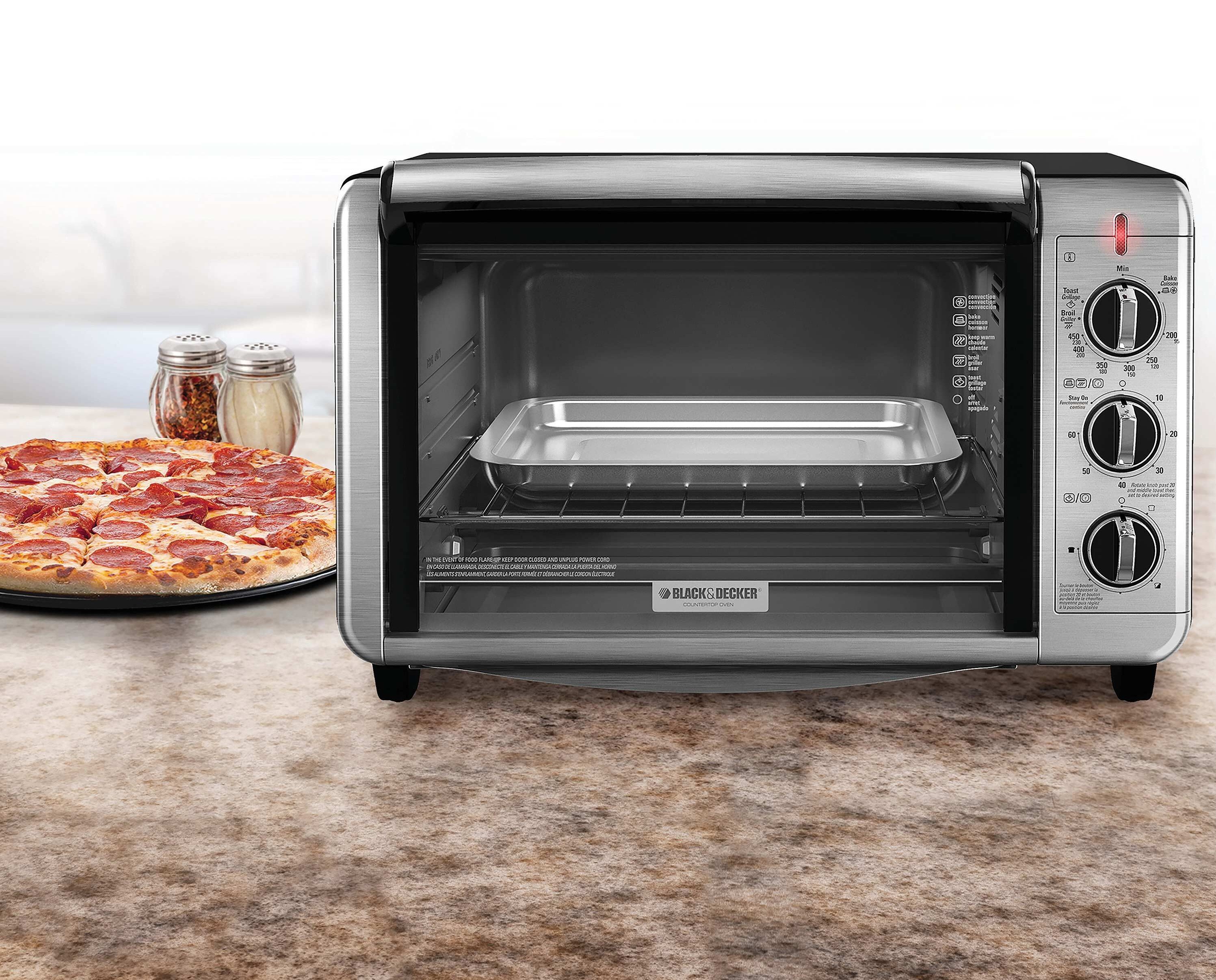 6 Slice Convection Countertop Toaster Oven in a cooking environment.