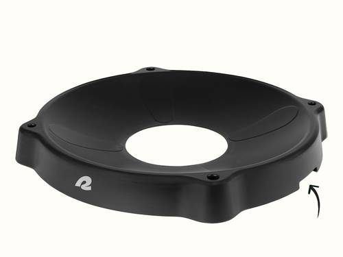 Black circular plastic yoga ball base with central opening and arrow pointing to bottom groove.