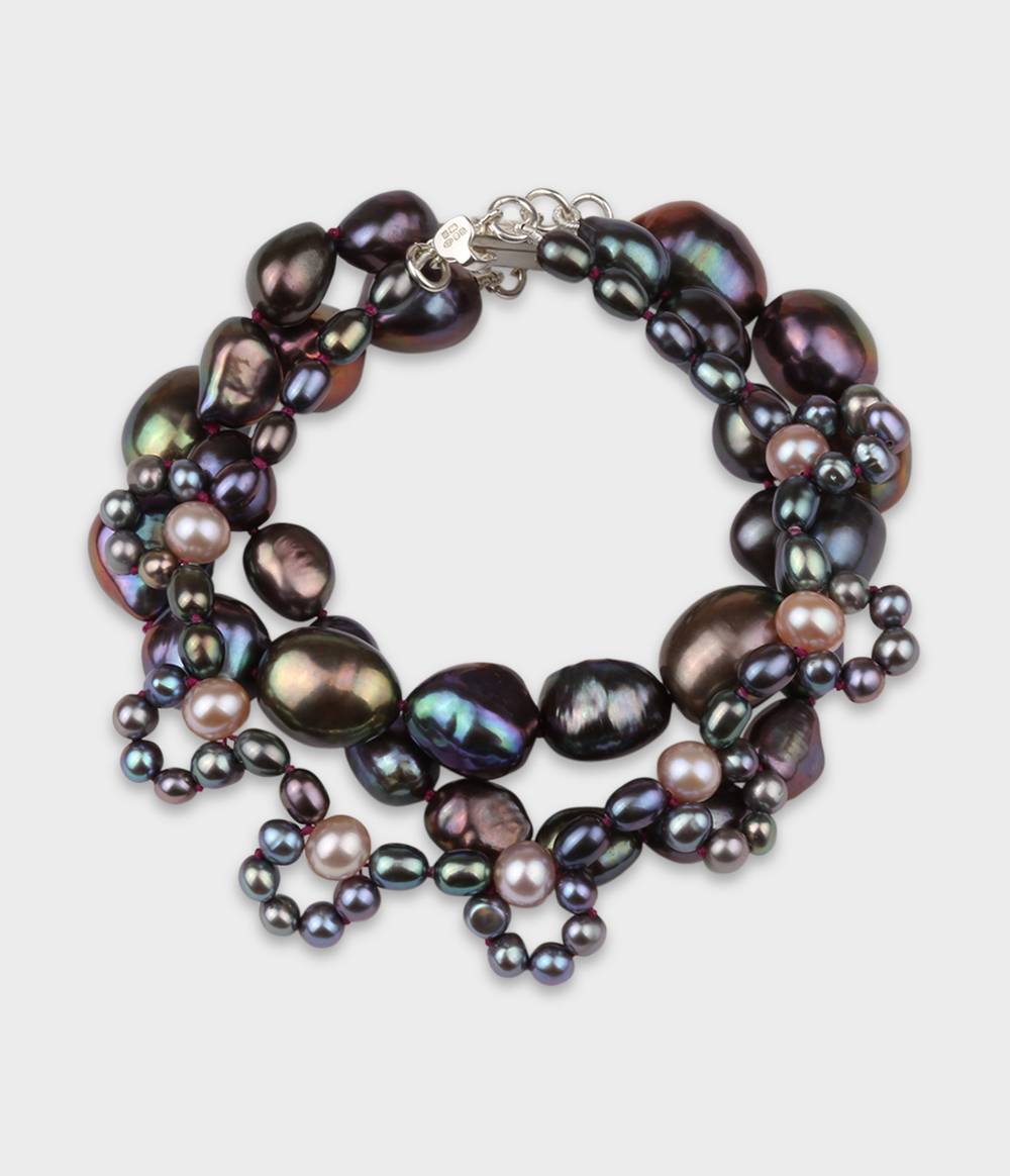 Peacock and pink pearl triple strand bracelet from the Coco collection.