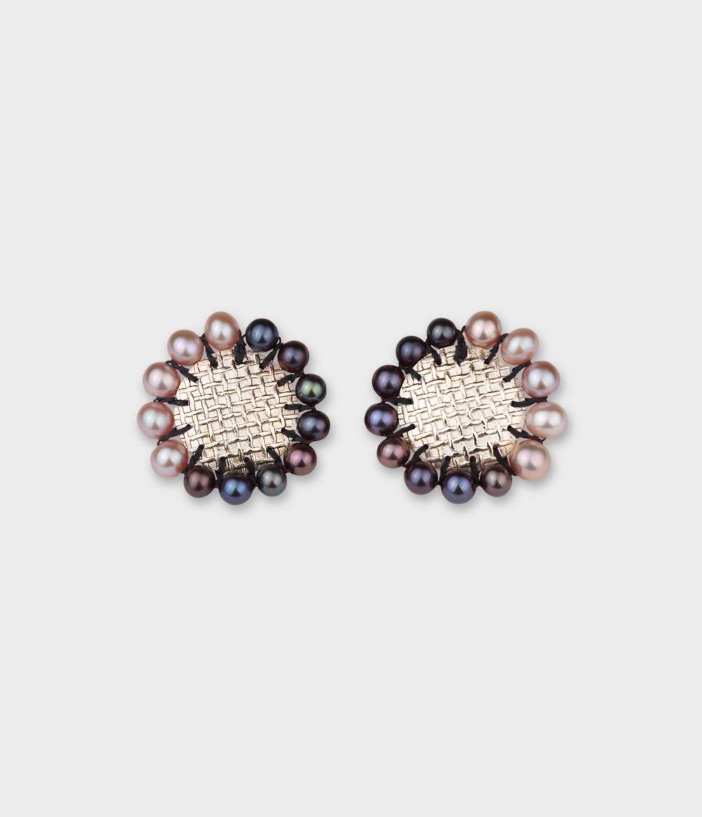 Silver round earrings with pink and peacock pearls all around from the Coco jewellery collection.