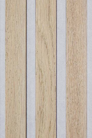 Close up of three washed oak slat wall slats on a grey felt backing