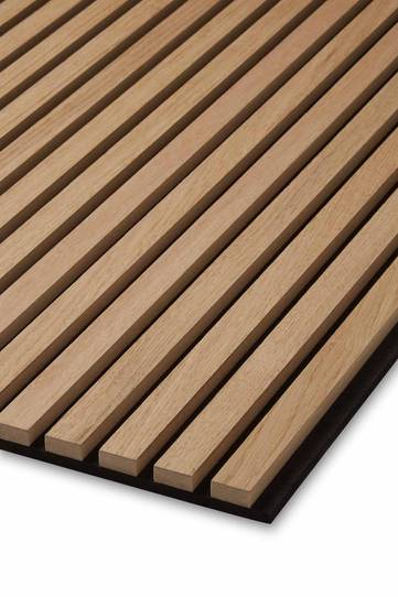 Close up of the corner of a Natural Oak SlatWall panel with an oiled finish.