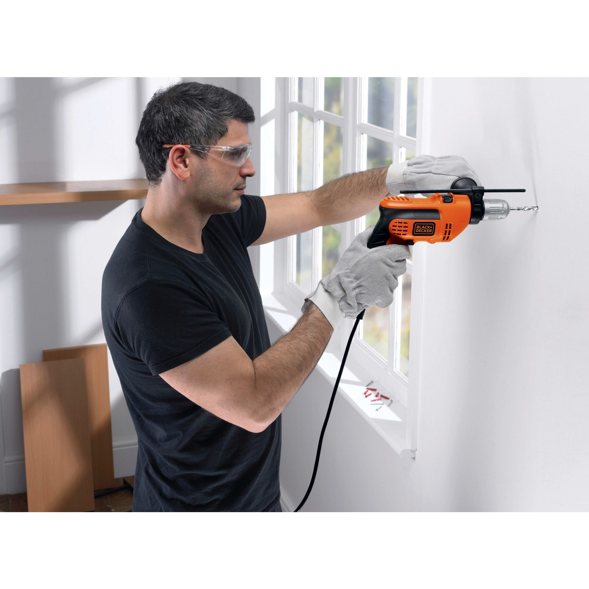 Man using electric drill