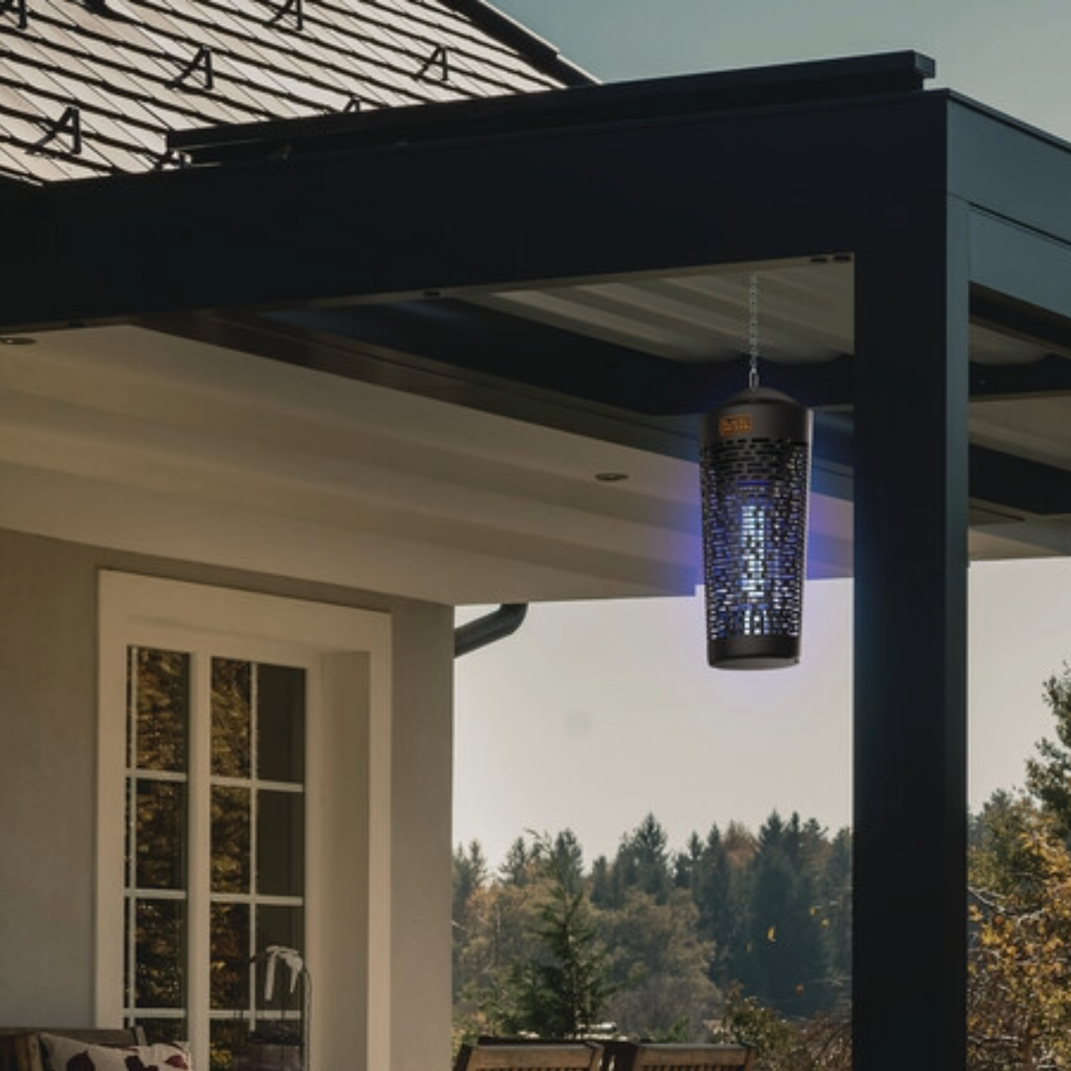 electric bug zapper hanging near a patio