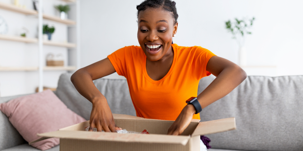 Woman unboxing a gift