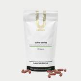 U Perform Active Berries antioxidant berry supplement blend red capsules next to product packaging white pouch