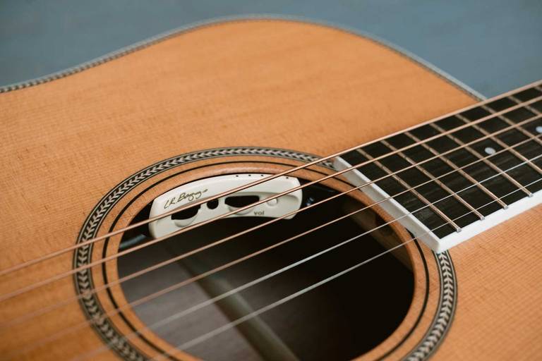 Close-up of the LR Baggs Anthem Pickup System controls inside the soundhole of an Orangewood guitar