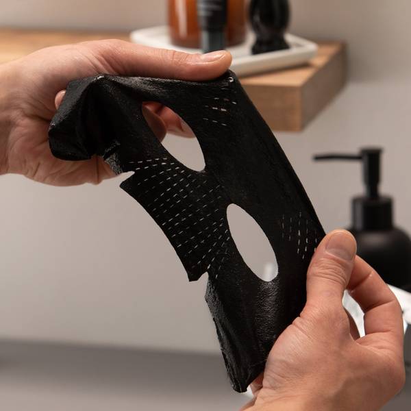 Cardon Skincare's face sheet mask for men has bamboo charcoal and expandable nose slits to fit any face size and shape.