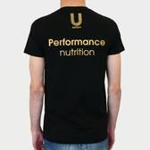 man wearing black U Perform Active T shirt facing backwards