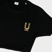 black and gold U Perform Active T Shirt folded up