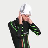 young man in black, green and orange swimming wetsuit wearing white and black silicone swimming cap with U Perform logo