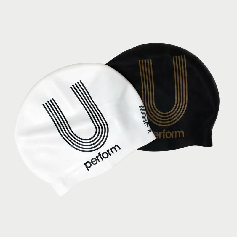 U Perform black, white, and gold silicone swimming caps
