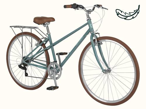 A vintage-style Kinney Mixte City Bike - 7 Speed in teal with brown accents, featuring a classic frame, padded seat, and a rear rack for carrying items on a white background with a drawn illustration of a feather in the top right corner.