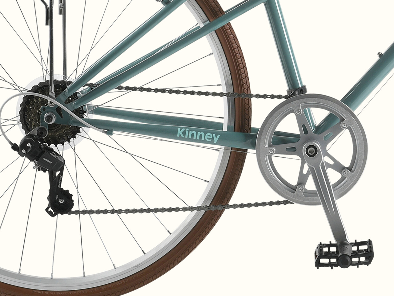 A close-up of the Kinney Mixte City Bike's drivetrain.
