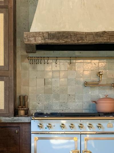 clé tile terracotta eastern elements rice paper tiles installed on a rustic kitchen backsplash