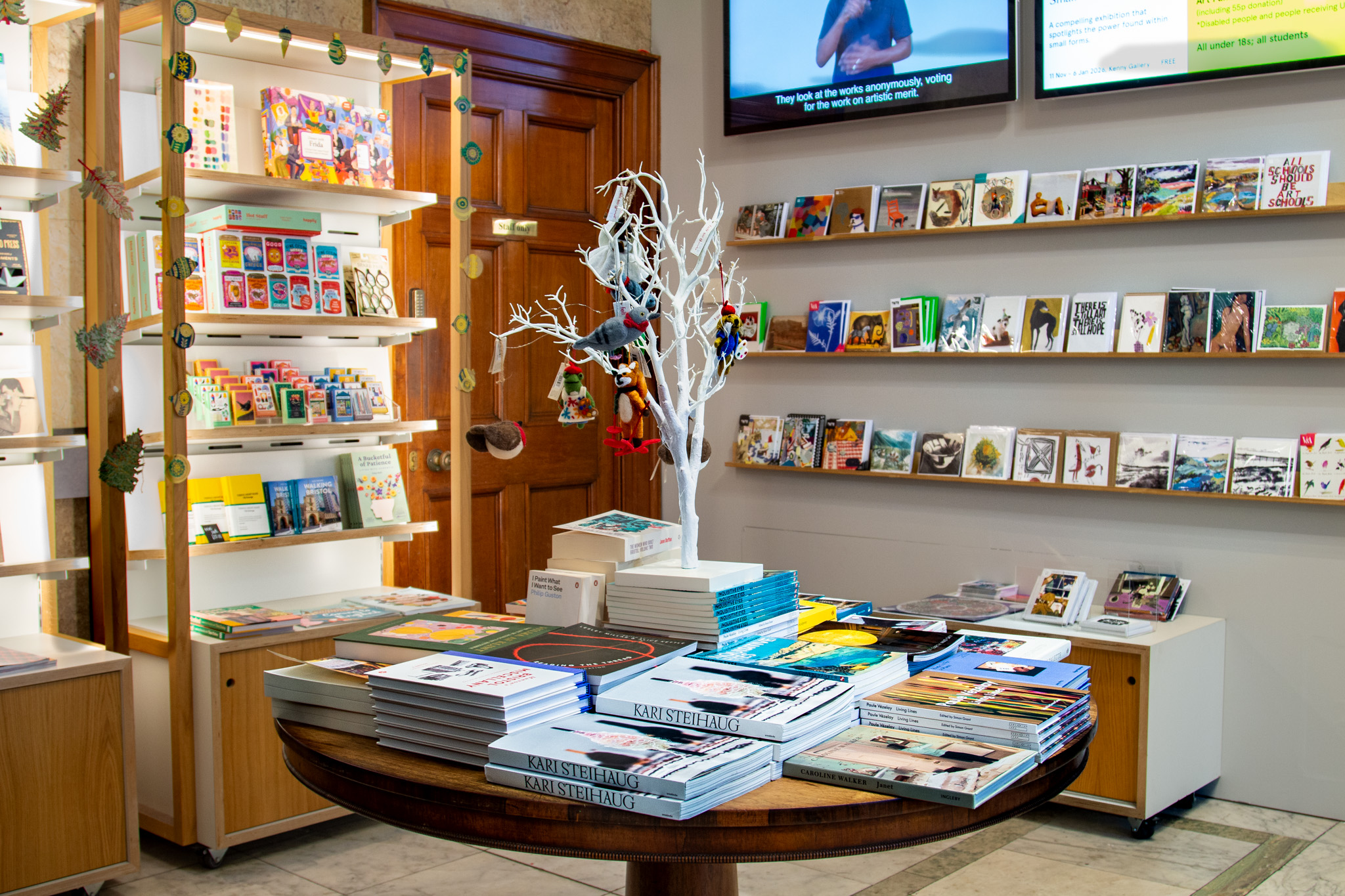 The RWA shop with shelves full of books, cards and gifts 