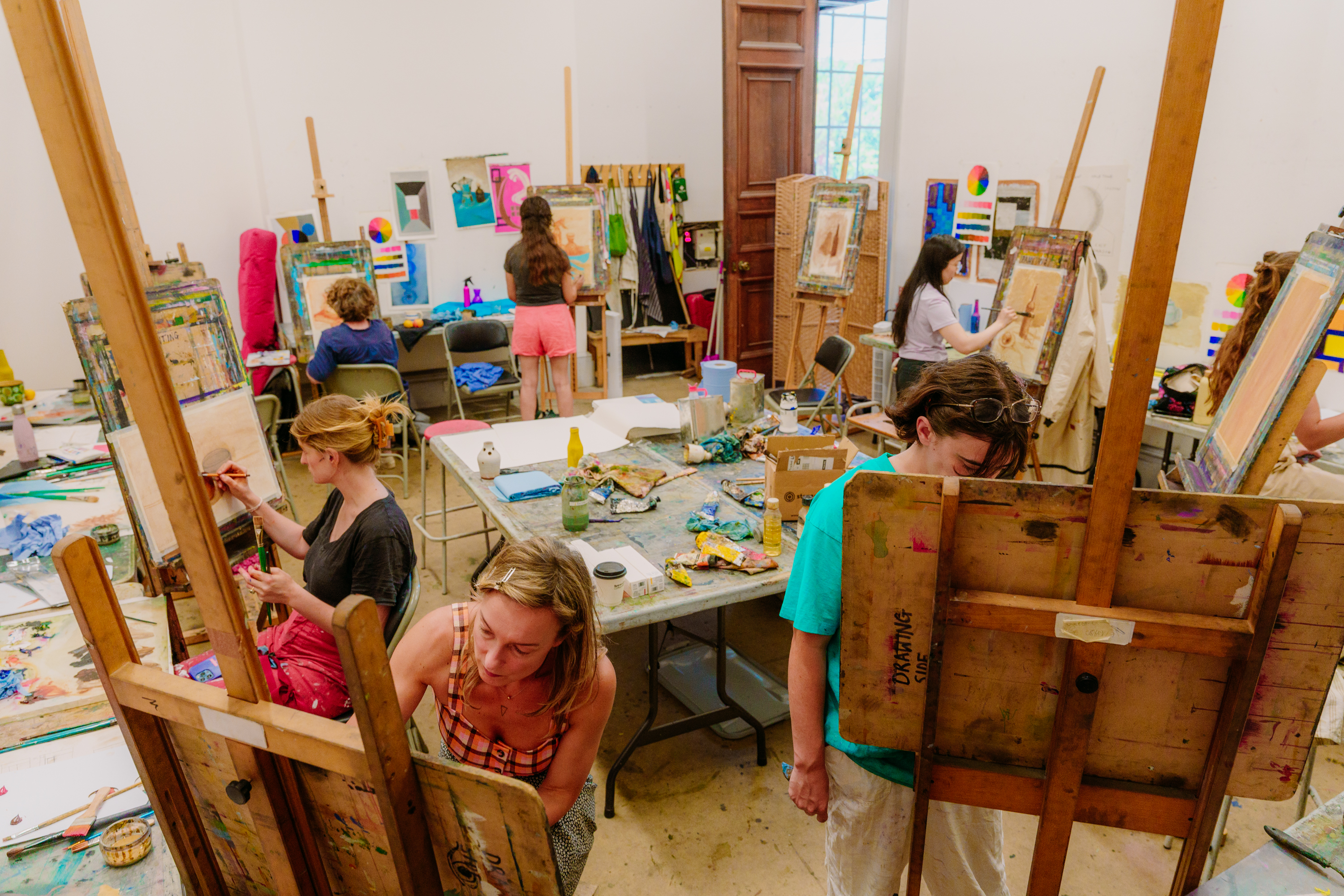 Overlooking the studio with students oil painting 