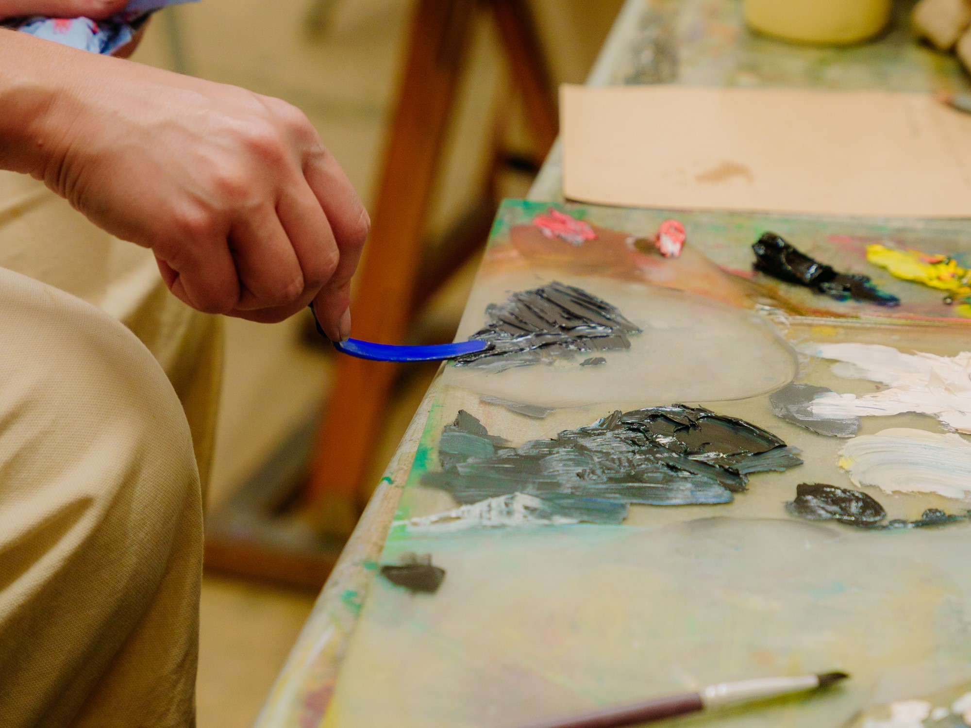 Overlooking the studio with students oil painting 