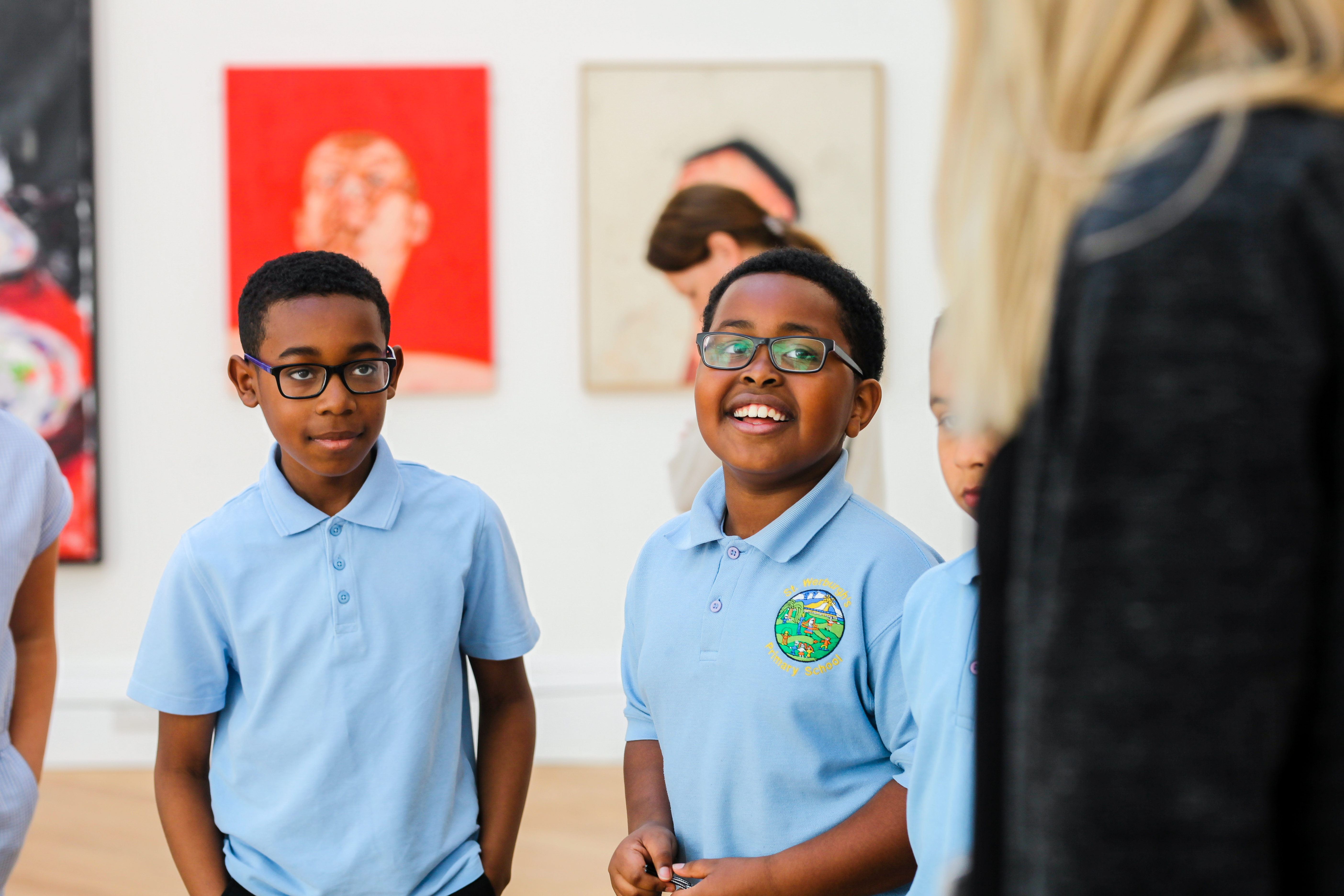 An image of two children in the gallery space 
