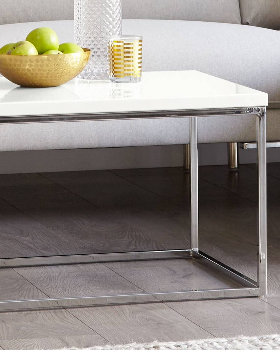 The Acute White High Gloss Coffee Table with Chrome Legs