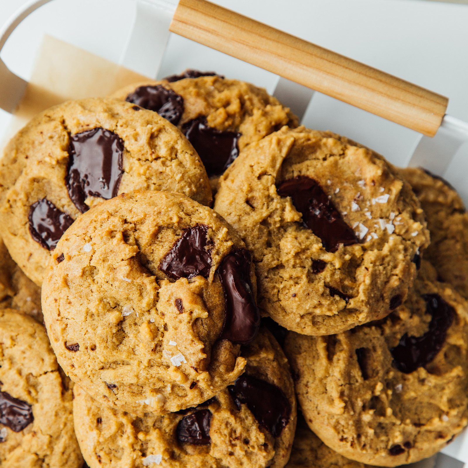 Close up view of Vegan chocolate chunk cookies in the Yamazaki Home Fruit basket. 