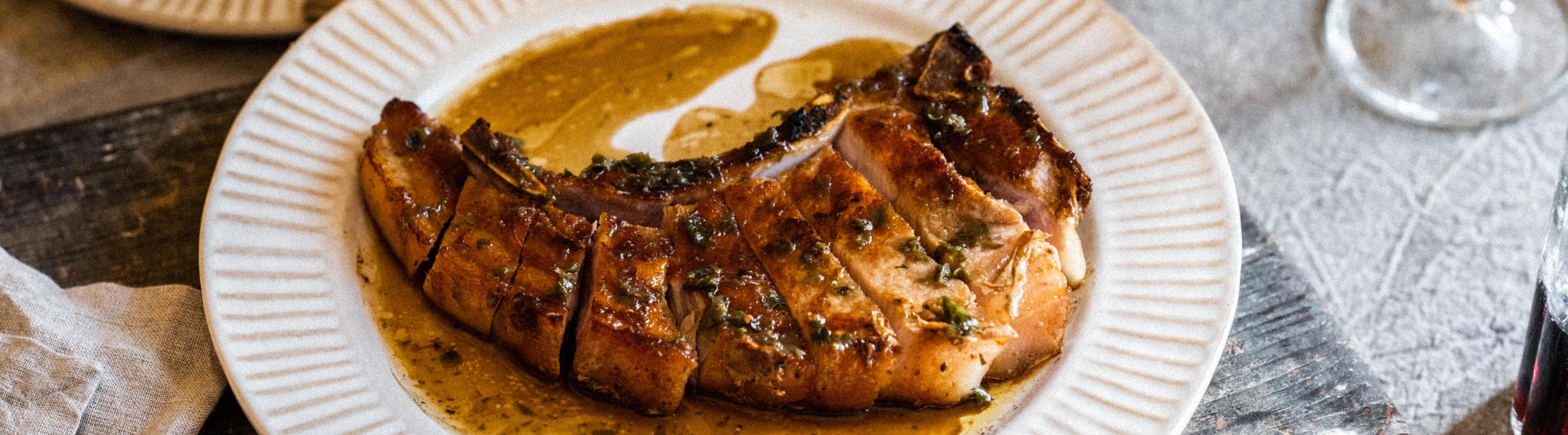 Pork chops with fried hispi cabbage and cider sauce 