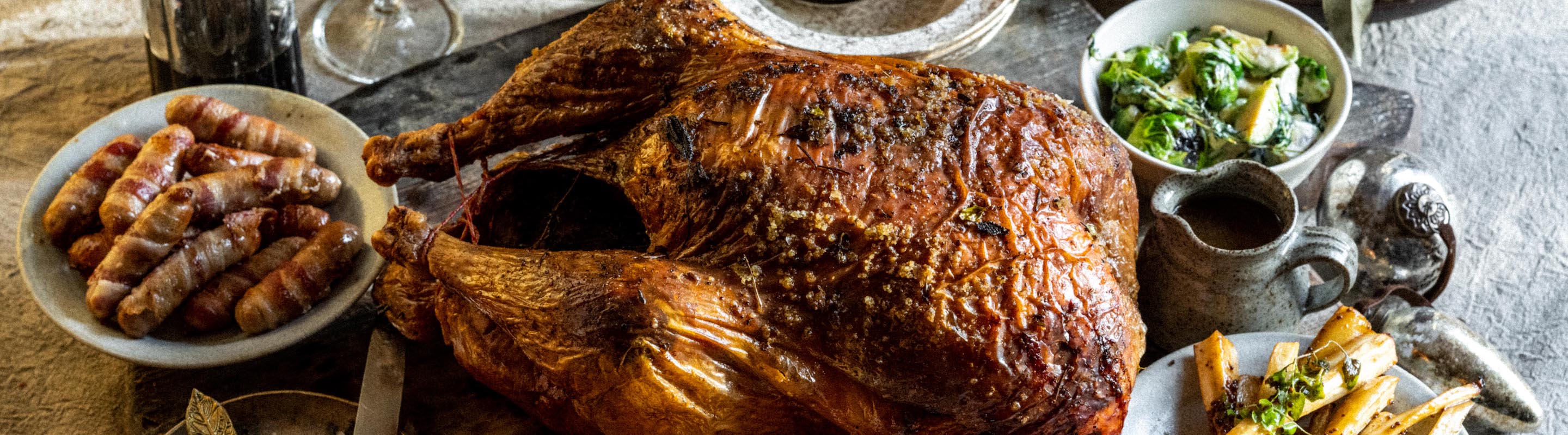 Roast turkey with
Roast Potatoes 
Glazed Parsnips 
Pigs in blankets 
Stuffing 
Gravy