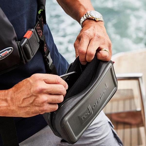 Man putting phone in Waterproof Pouch