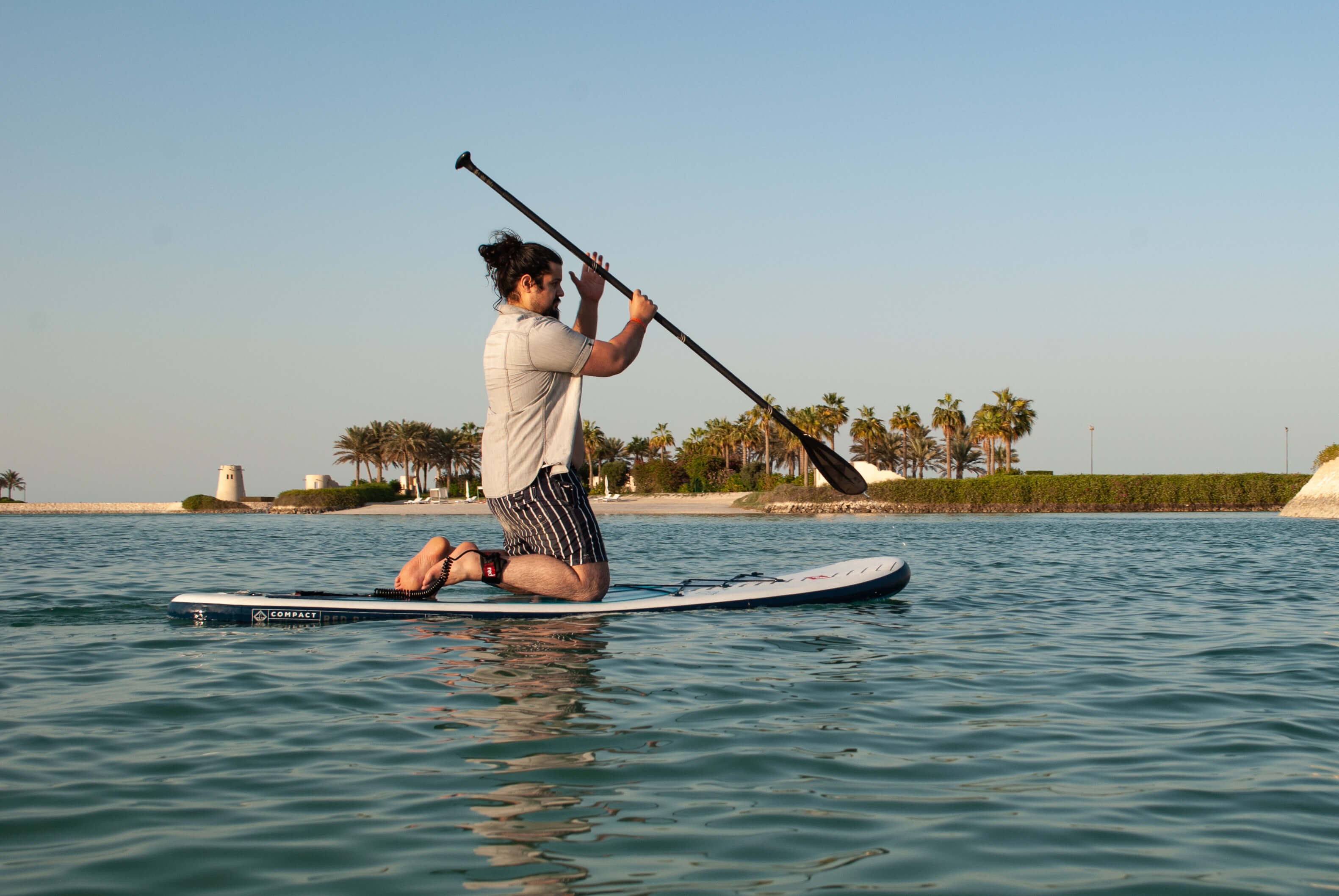 Beginner Learning To Paddle Board While Kneeling on a Compact SUP
