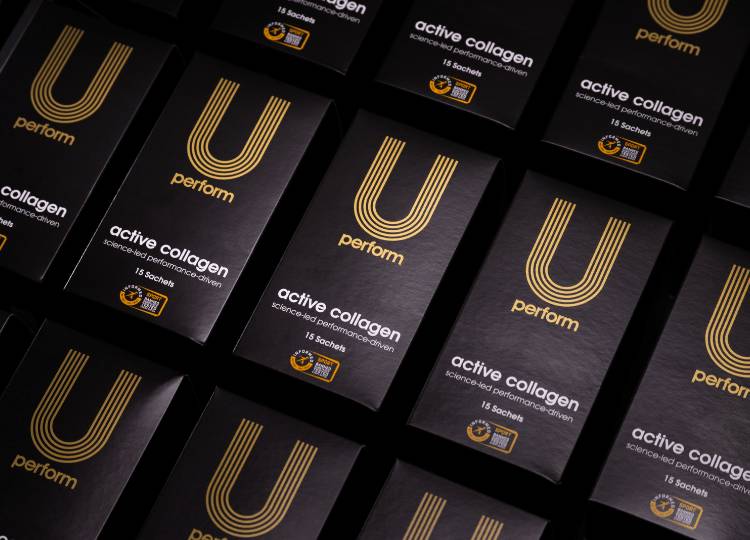 U Perform Active Collagen boxes lined up on a black background