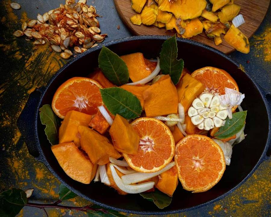 Pumpkin and mandarin soup ingredients chopped up in the Old Dutch pot