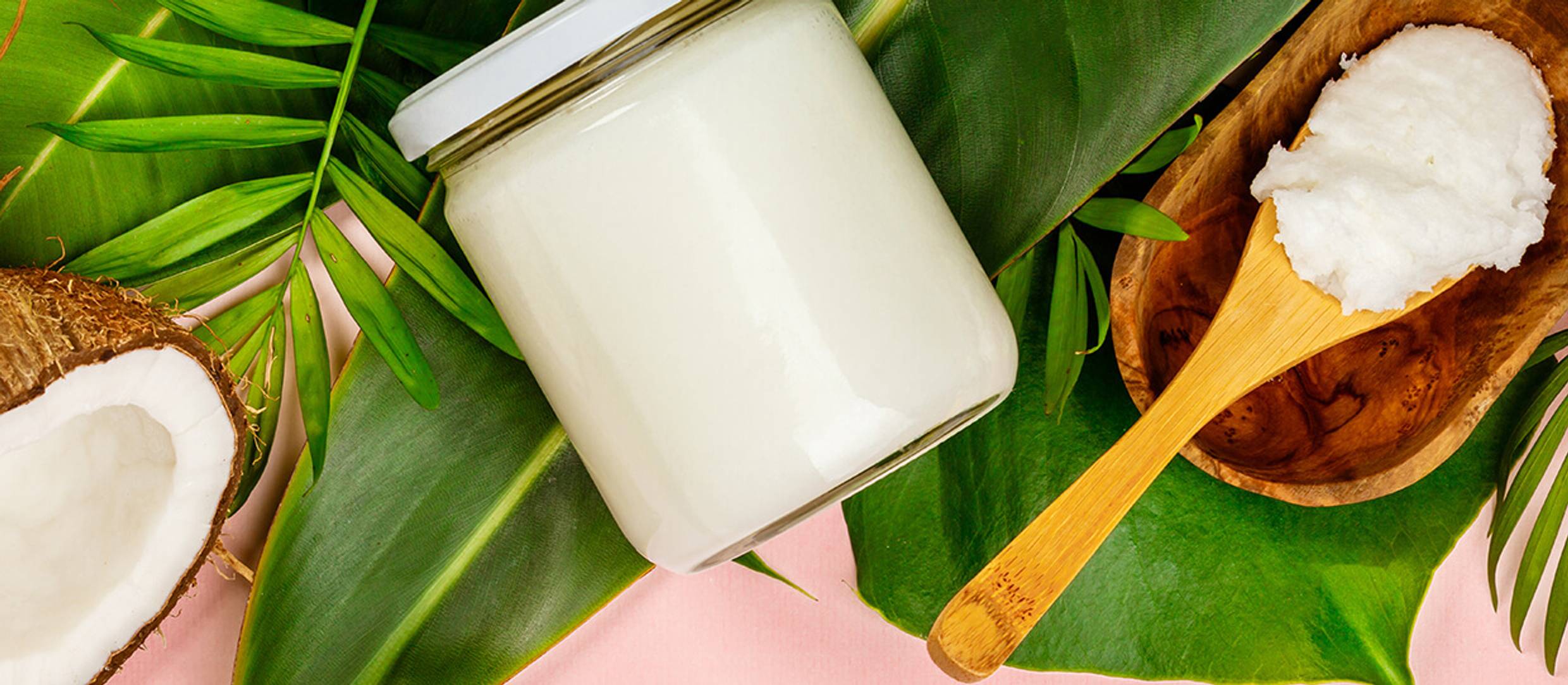 Un-fractionated coconut massage oil in jar vs Holly Massage Oil