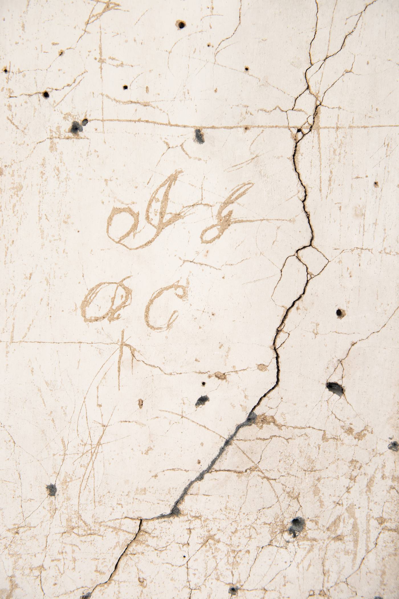 Cursive letters on old paper