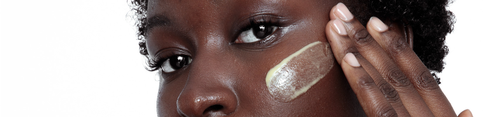 Woman Applying Advanced Supercell Serum To Her Face