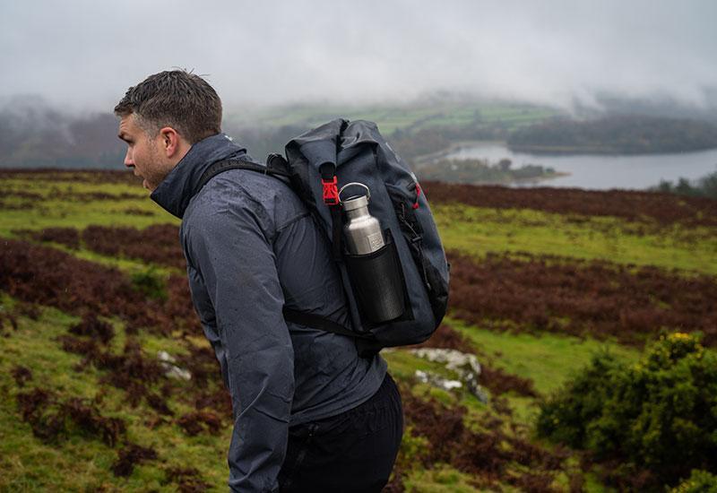 a man hiking with a backpack