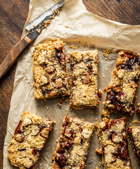Rhubarb & Jam Crumble Bars, by Abby Allen  Pipers Farm Recipe  Sustainable Seasonal Eating  Artisan Food Delivered Direct To Your Door  Picnic Ideas & Inspiration  Hodmedods Oats Gilchesters Flour Quickes Butter Small Batch Fruit Jam